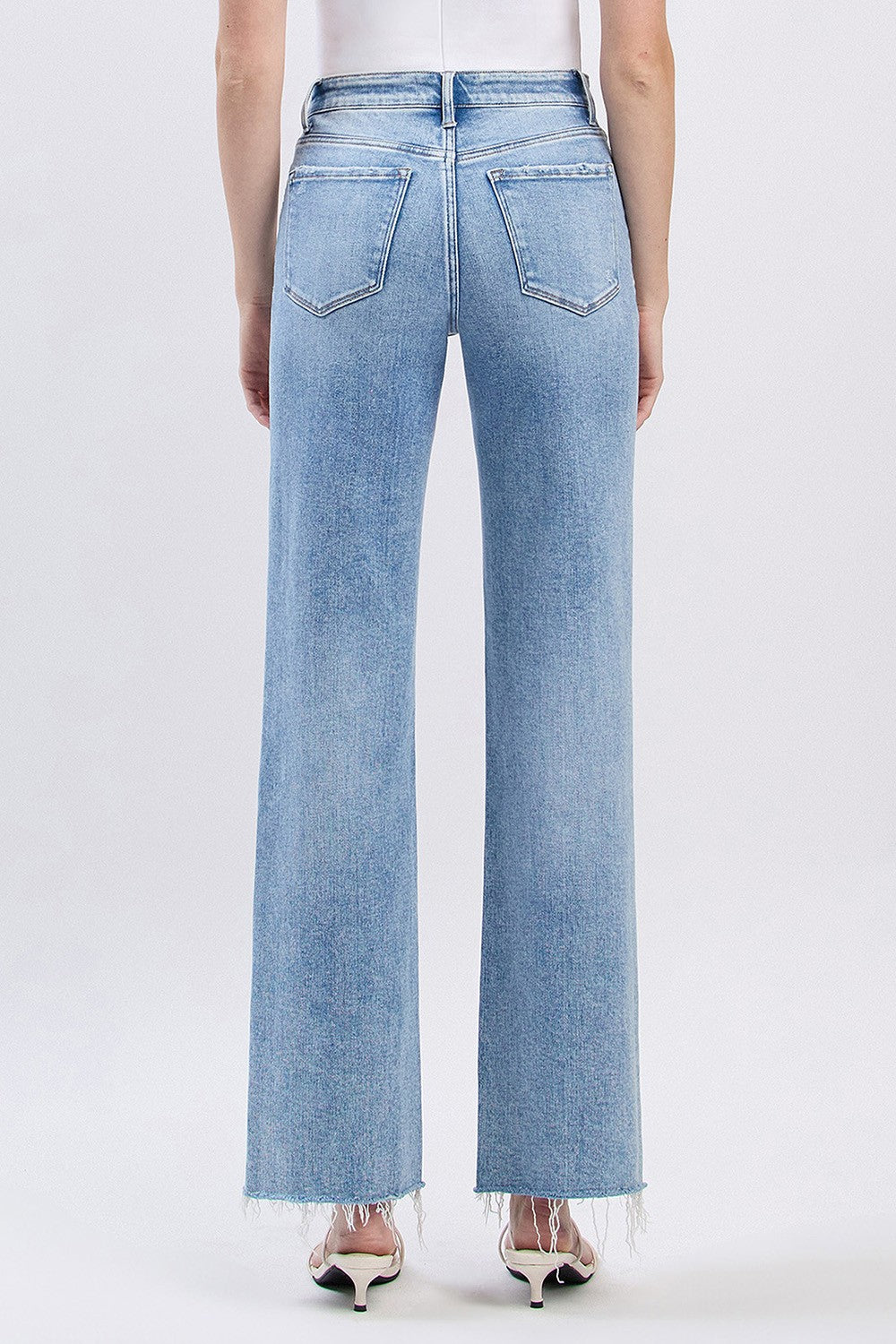 The Billie High Rise Distressed Slim Wide Leg Jeans