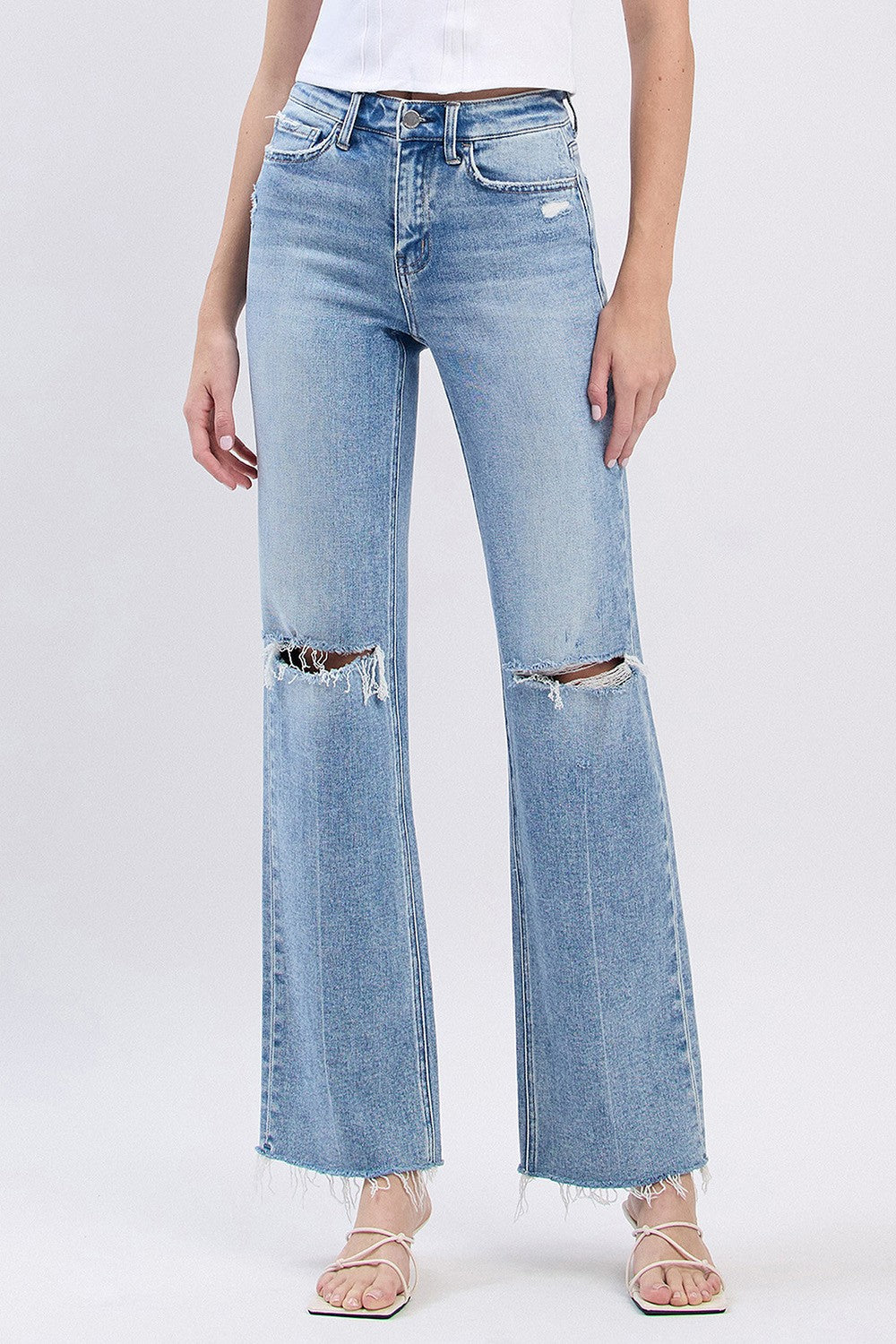 The Billie High Rise Distressed Slim Wide Leg Jeans