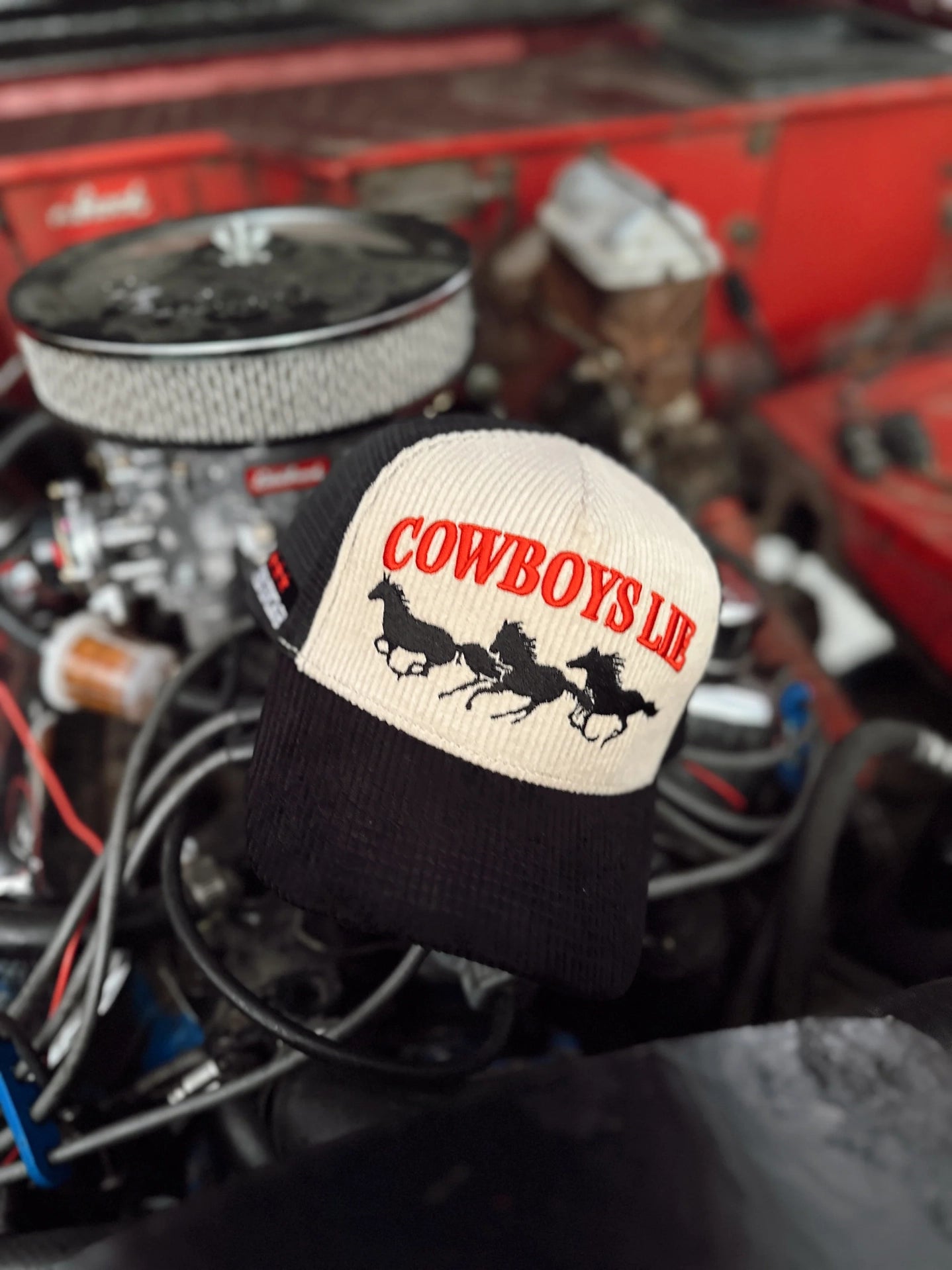 Cowboys Lie Mustang Trucker Hat