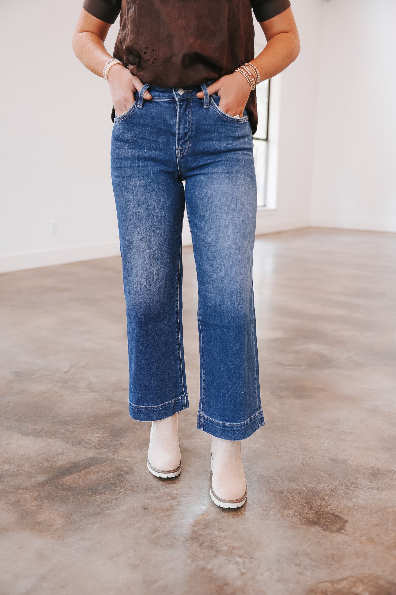 The Callie High Rise Trouser Hem Wide Leg Jeans