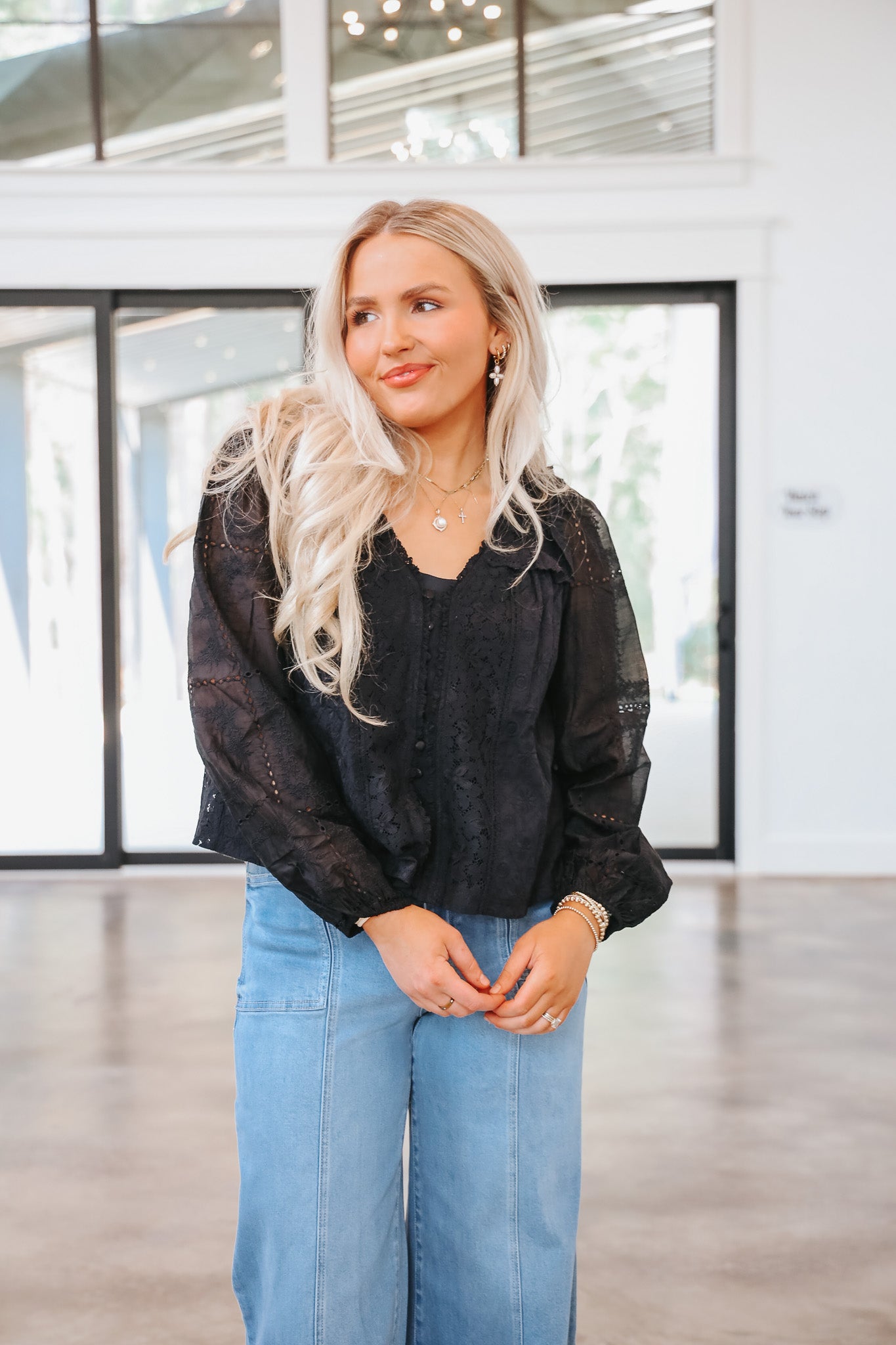 Lost In The Moment Black Ruffle Top