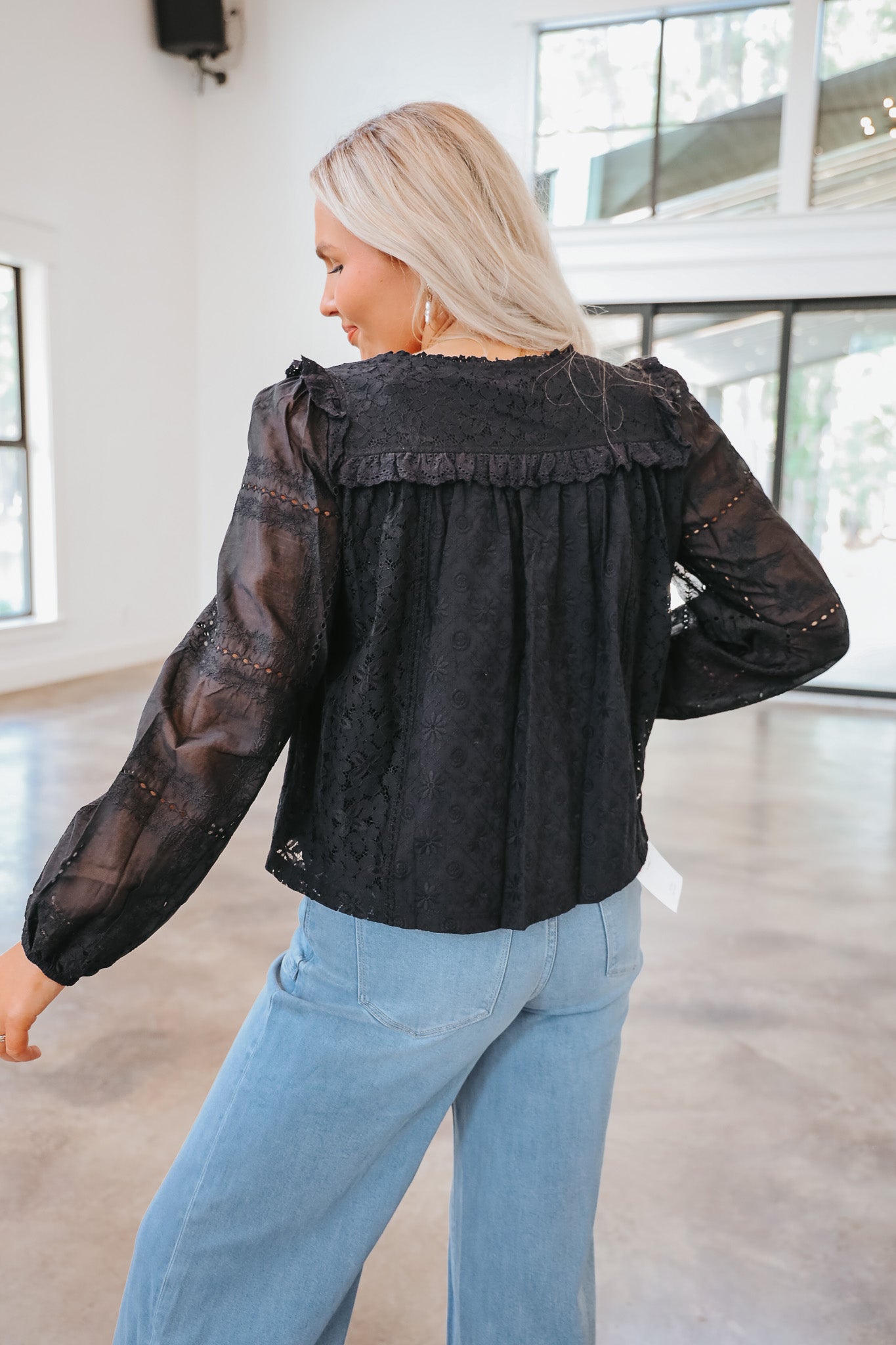 Lost In The Moment Black Ruffle Top