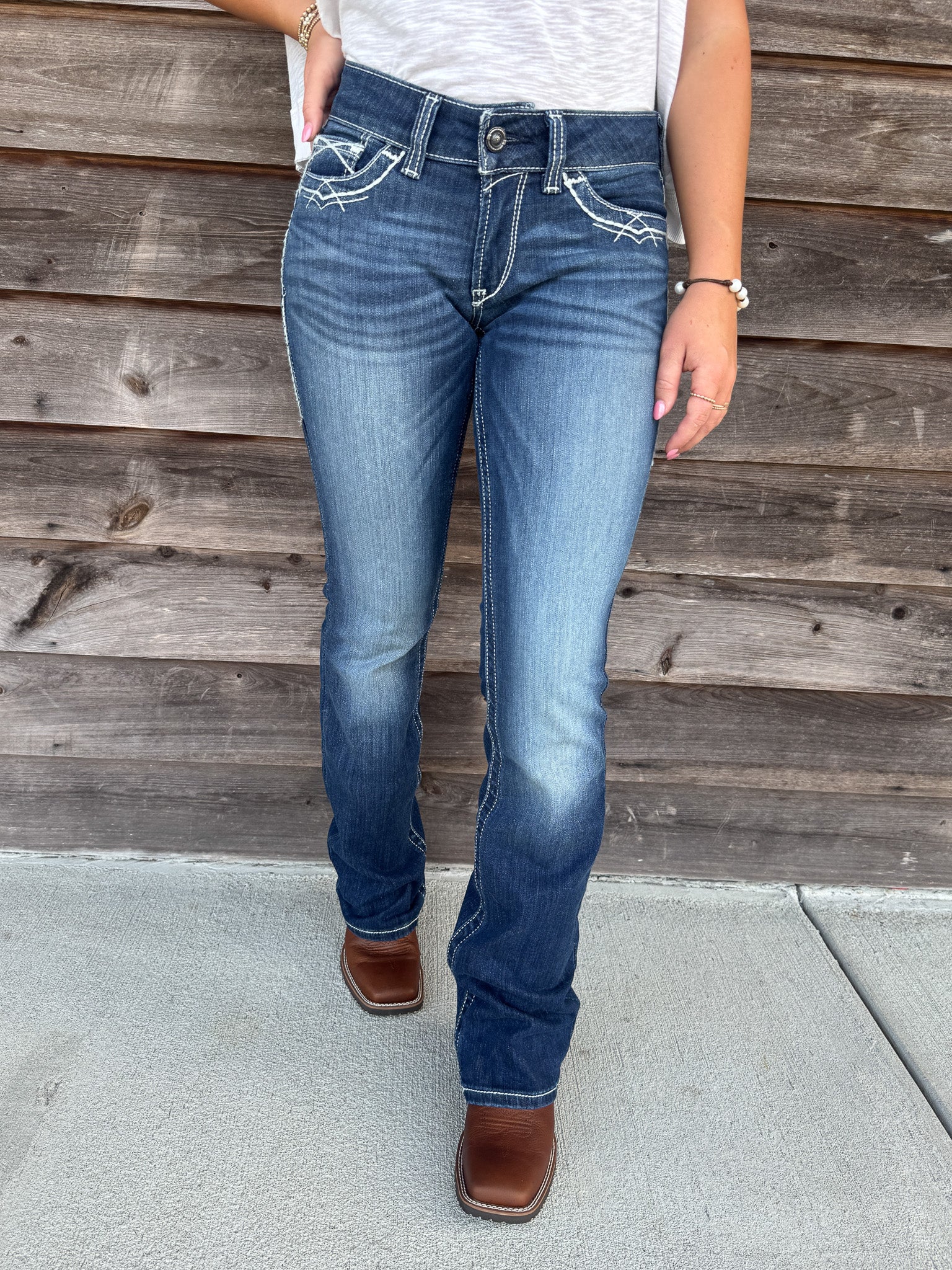 Vaqueros con corte de bota entrelazados elásticos de talle medio Ariat REAL