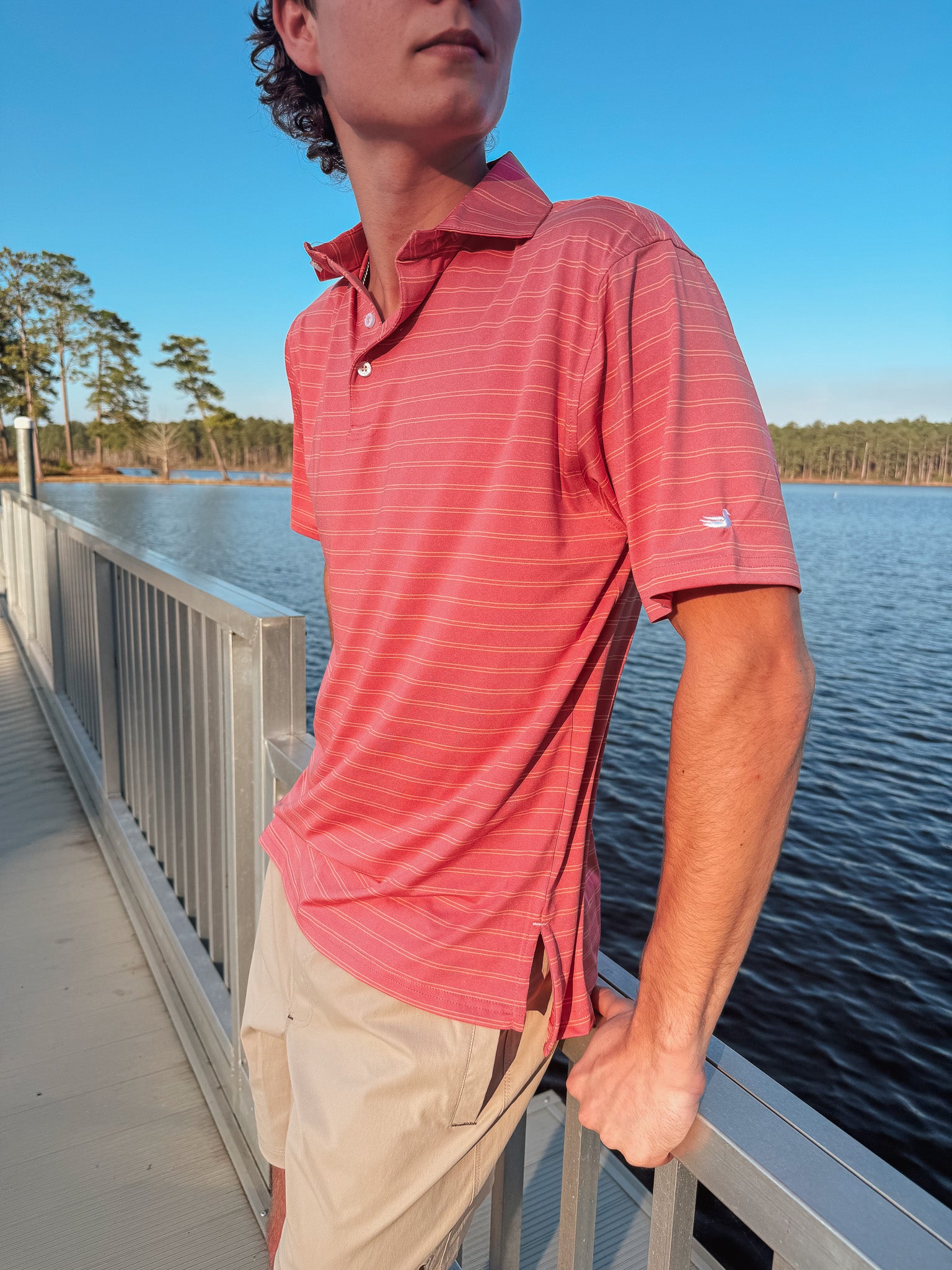 Men's Southern Marsh Newcastle Stripe Featherlight Polo in Coral
