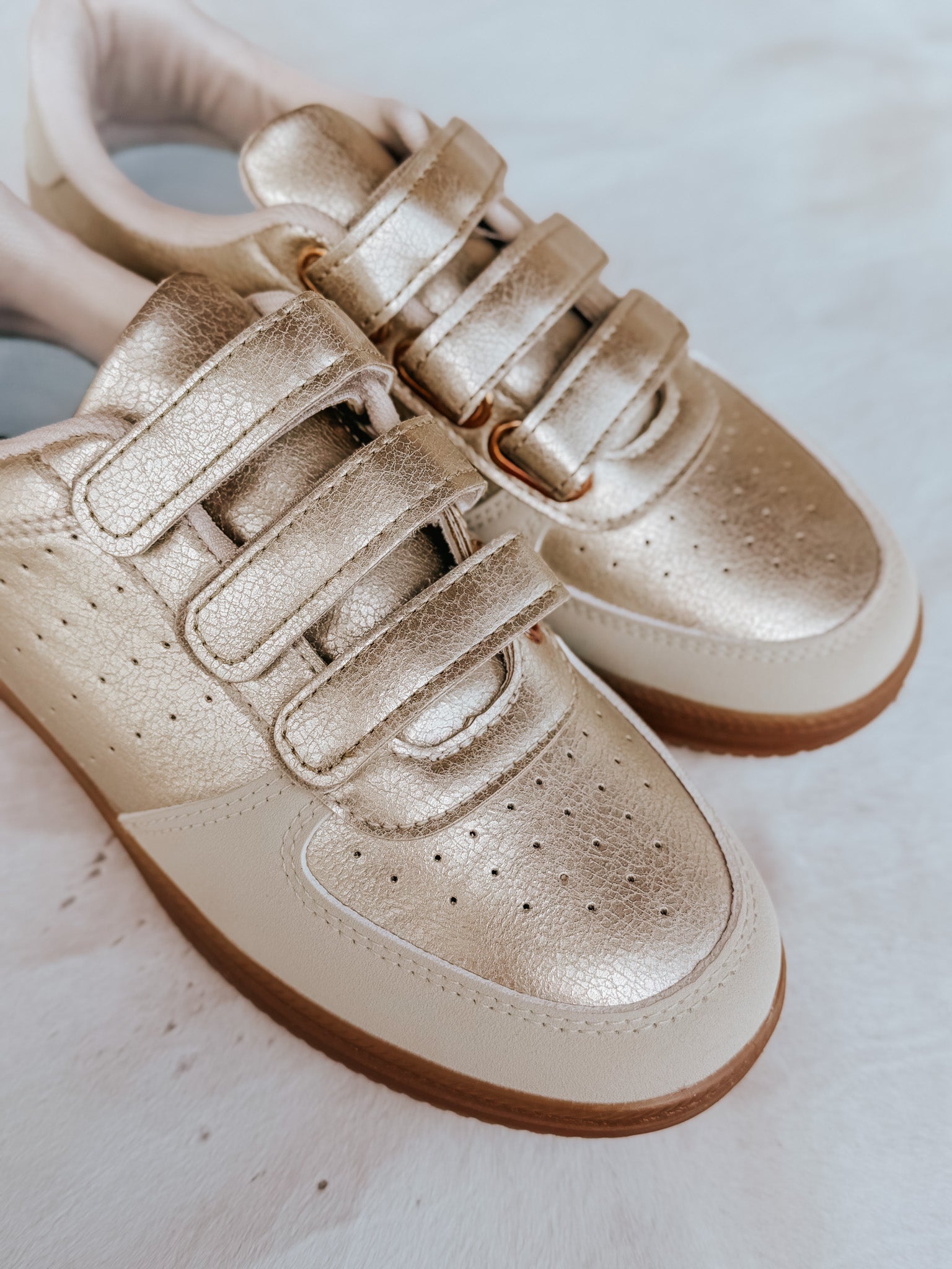 The Madelyn Sneaker in Gold