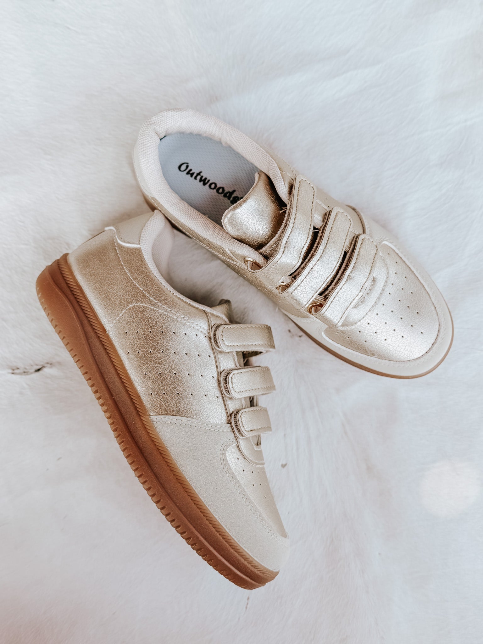 The Madelyn Sneaker in Gold