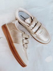 The Madelyn Sneaker in Gold