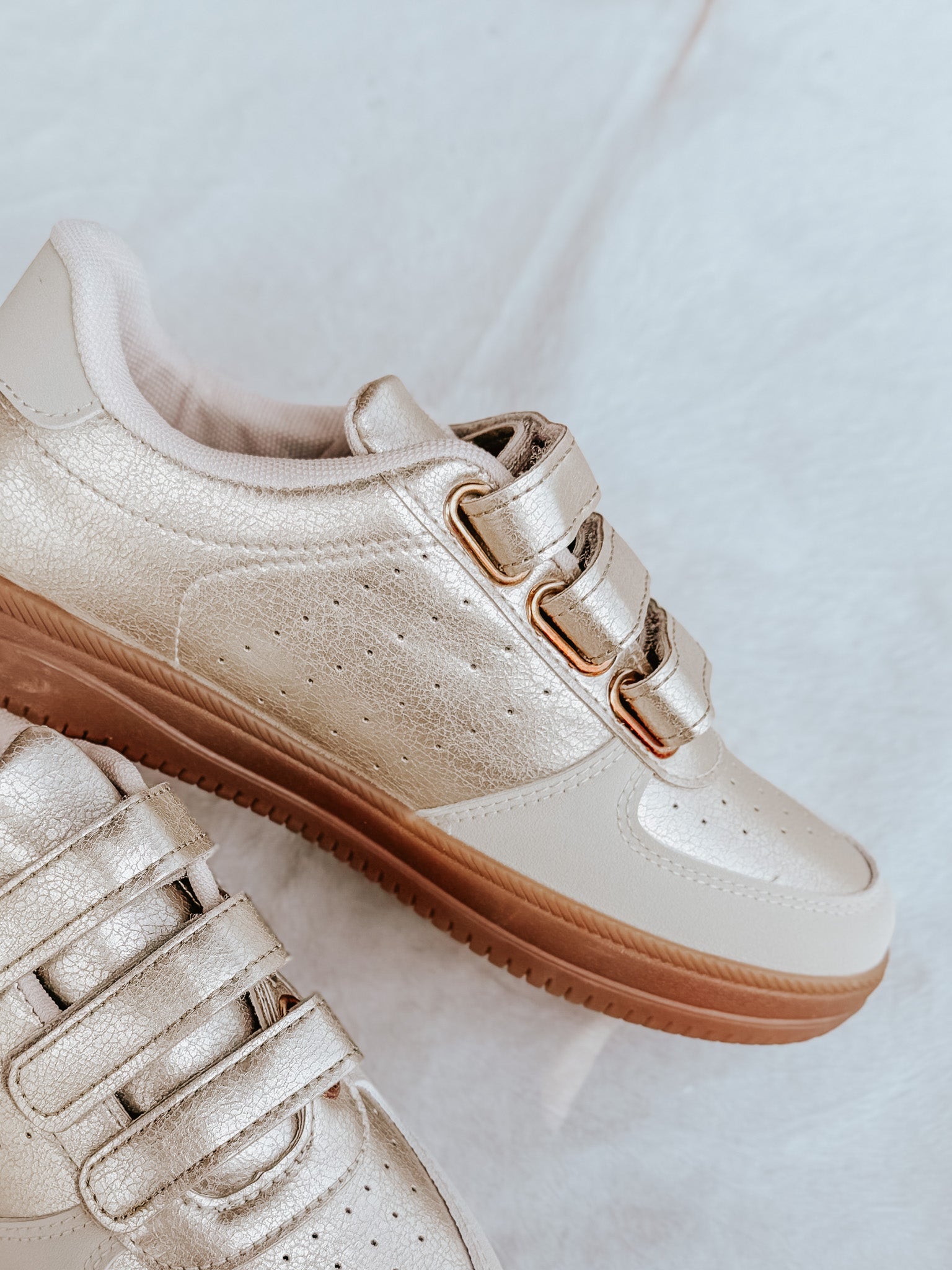 The Madelyn Sneaker in Gold