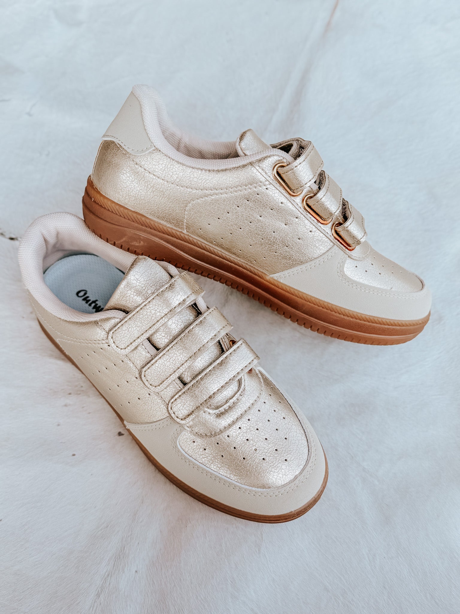 The Madelyn Sneaker in Gold