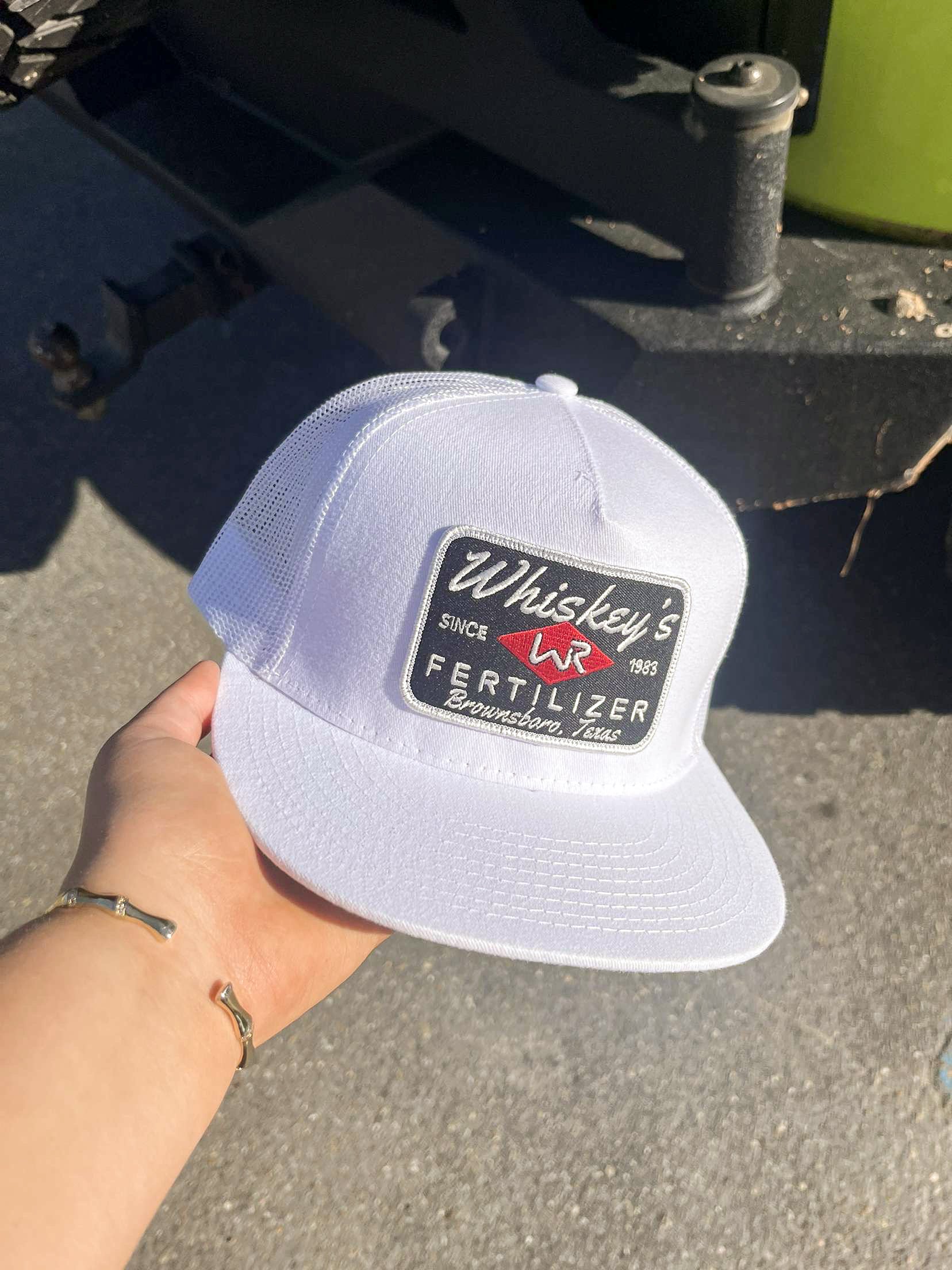 Whiskey Bent Hat Co. Tapa de fertilizante